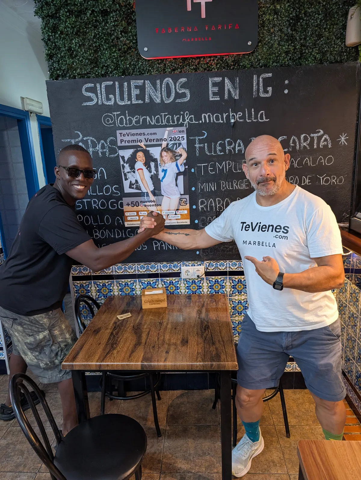 Use the most human and clear image: Santi working with a local business, with TeVienes visible and devices showing events, Google or a landing page.